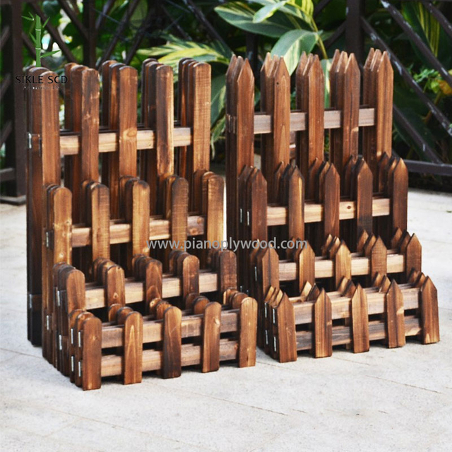 Valla de madera carbonizada